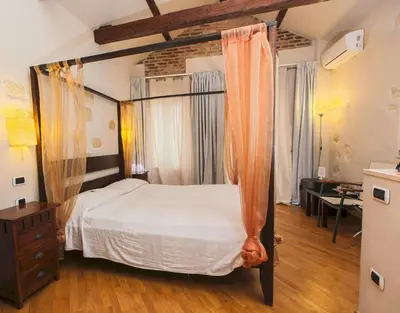 Letto o letti in una camera di Maison Savoia B&b Apartment