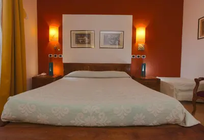 Letto o letti in una camera di Maison Savoia B&b Apartment