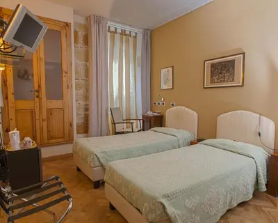 Letto o letti in una camera di Maison Savoia B&b Apartment