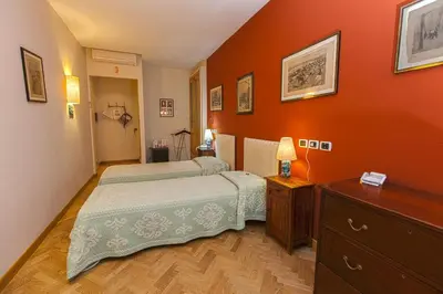 Letto o letti in una camera di Maison Savoia B&b Apartment