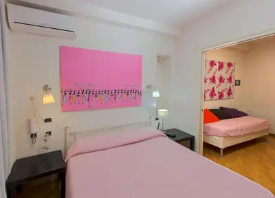 Letto o letti in una camera di Maison Savoia B&b Apartment