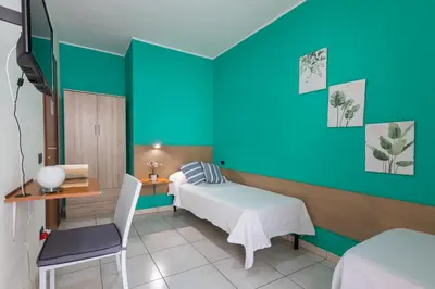 Letto o letti in una camera di Ogliastra Apartment Rooms
