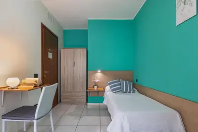 Letto o letti in una camera di Ogliastra Apartment Rooms