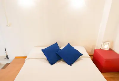 Letto o letti in una camera di Modern Apartment in Historic Building