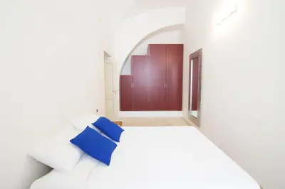 Letto o letti in una camera di Modern Apartment in Historic Building