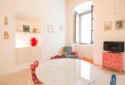 TV o dispositivi per l'intrattenimento presso Modern Apartment in Historic Building