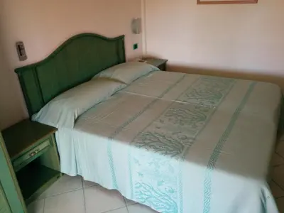 Letto o letti in una camera di Hotel Blu Marlin