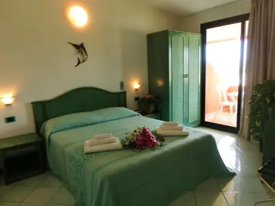 Letto o letti in una camera di Hotel Blu Marlin