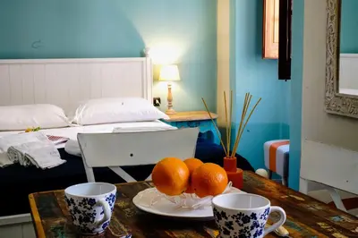 Letto o letti in una camera di Sofia Family Suites