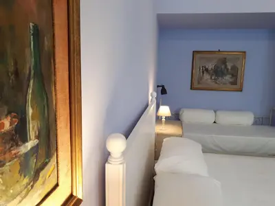 Letto o letti in una camera di Sofia Family Suites