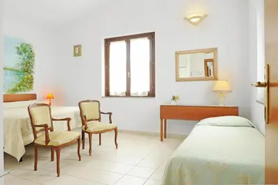Letto o letti in una camera di Il Giardino di Valentina