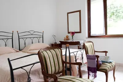Letto o letti in una camera di Il Giardino di Valentina