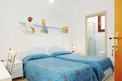 Letto o letti in una camera di Il Giardino di Valentina