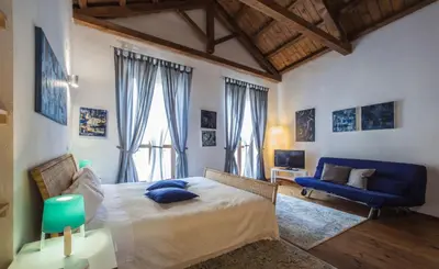 Letto o letti in una camera di Studio Apartments Centro Storico Via Manno