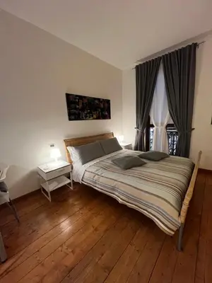 Letto o letti in una camera di Studio Apartments Centro Storico Via Manno