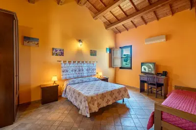 Letto o letti in una camera di Nuraximannu Boutique B&B