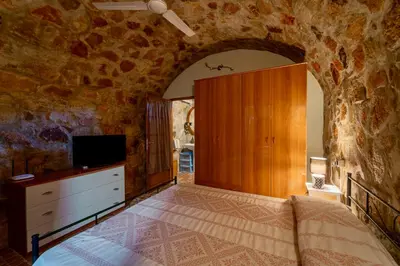 Letto o letti in una camera di Nuraximannu Boutique B&B