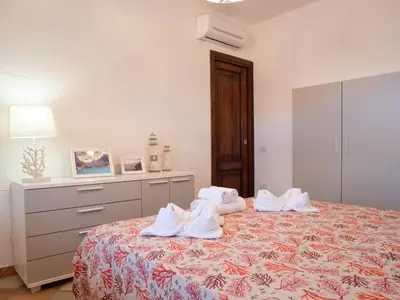 Letto o letti in una camera di Il Blu Tanca Piras