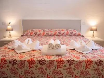 Letto o letti in una camera di Il Blu Tanca Piras