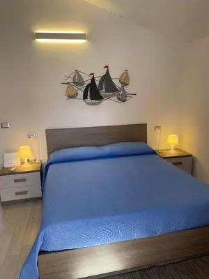Letto o letti in una camera di Casa Vacanze Calabro'