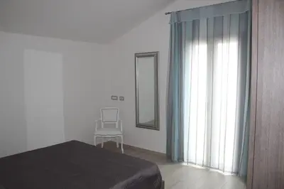 Letto o letti in una camera di Casa Vacanze Calabro'