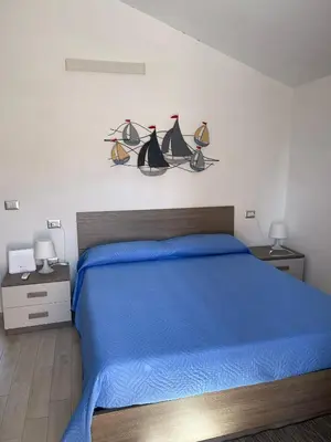 Letto o letti in una camera di Casa Vacanze Calabro'