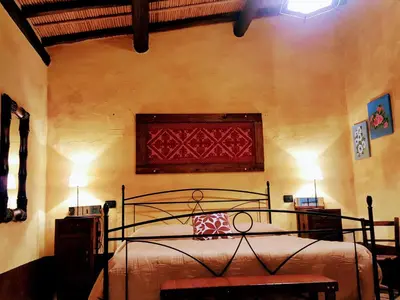 Letto o letti in una camera di Sa Corti De Sa Perda Piscinas