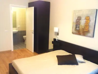 Letto o letti in una camera di Bella Cagliari B&B