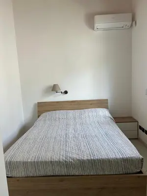 Letto o letti in una camera di Villa Belvedere