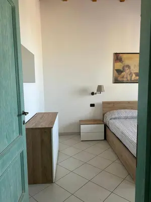 Letto o letti in una camera di Villa Belvedere
