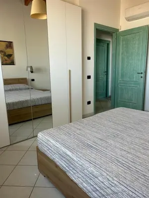 Letto o letti in una camera di Villa Belvedere
