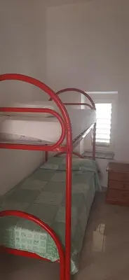 Letto o letti in una camera di Il pergolato