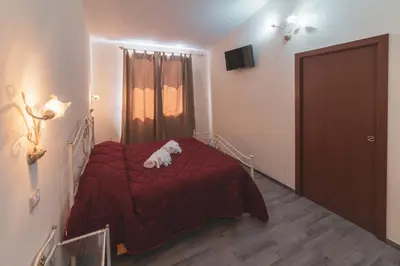 Letto o letti in una camera di Villa Alberta Hotel