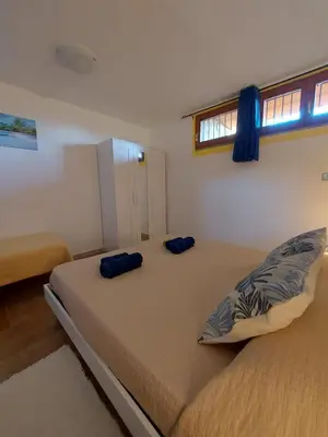 Letto o letti in una camera di Sa Domu
