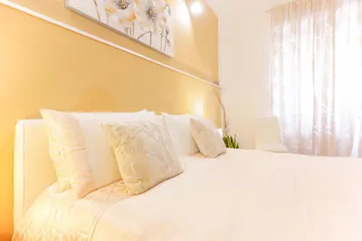 Letto o letti in una camera di Montellino's Suite Oro