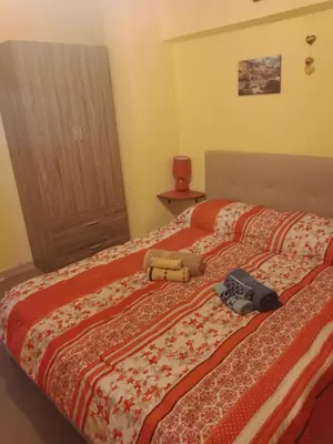 Letto o letti in una camera di AL MARE, AL SOLE, SI', ma nella CASA DEL MINATORE