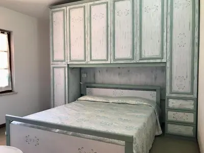 Letto o letti in una camera di MARIA'S HOUSE