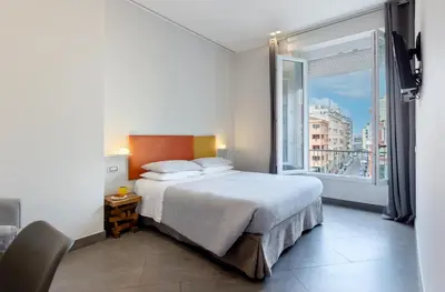 Letto o letti in una camera di Centro storico via Sassari Accommodation
