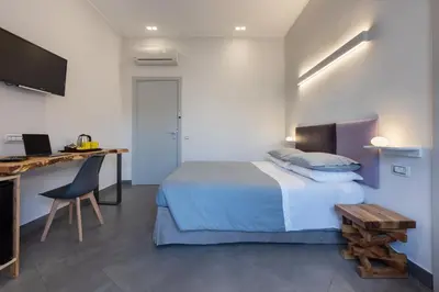 Letto o letti in una camera di Centro storico via Sassari Accommodation