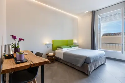 Letto o letti in una camera di Centro storico via Sassari Accommodation