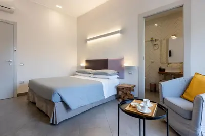 Letto o letti in una camera di Centro storico via Sassari Accommodation