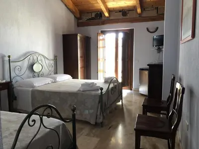 Letto o letti in una camera di Sa Crannaccia