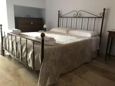 Letto o letti in una camera di Sa Crannaccia