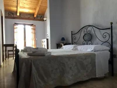 Letto o letti in una camera di Sa Crannaccia