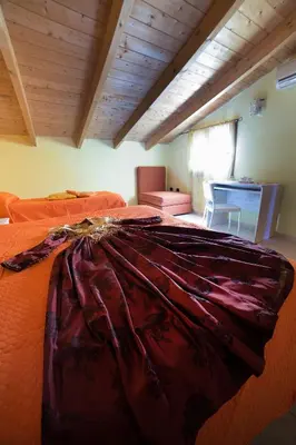 Letto o letti in una camera di B&B Il Nido