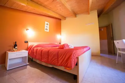 Letto o letti in una camera di B&B Il Nido