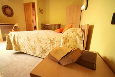 Letto o letti in una camera di B&B Il Nido