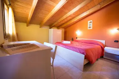Letto o letti in una camera di B&B Il Nido