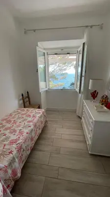Letto o letti in una camera di Villa Biancaluna