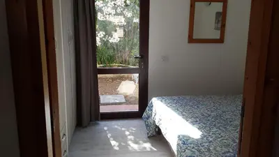 Letto o letti in una camera di Bilocale a pochi passi dal mare